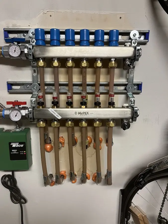 Plumber performing Leak Detection at a residential property in Sudley